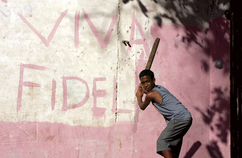 A boy steps up to bat in a pickup game in Havana. By Claudia Daut/Reuters/Corbis.Vanity Fair